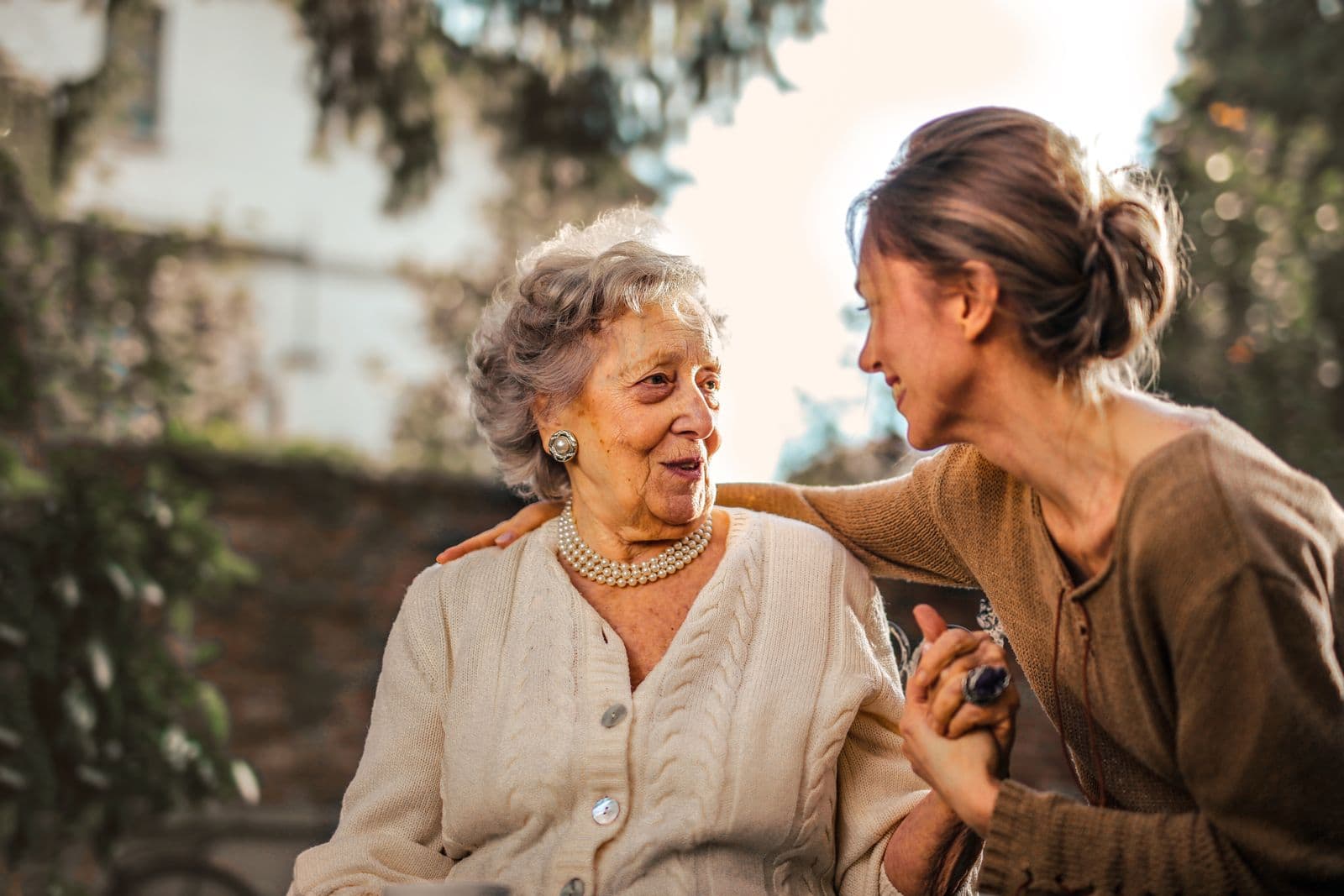 Caregiver offering support to a senior rider